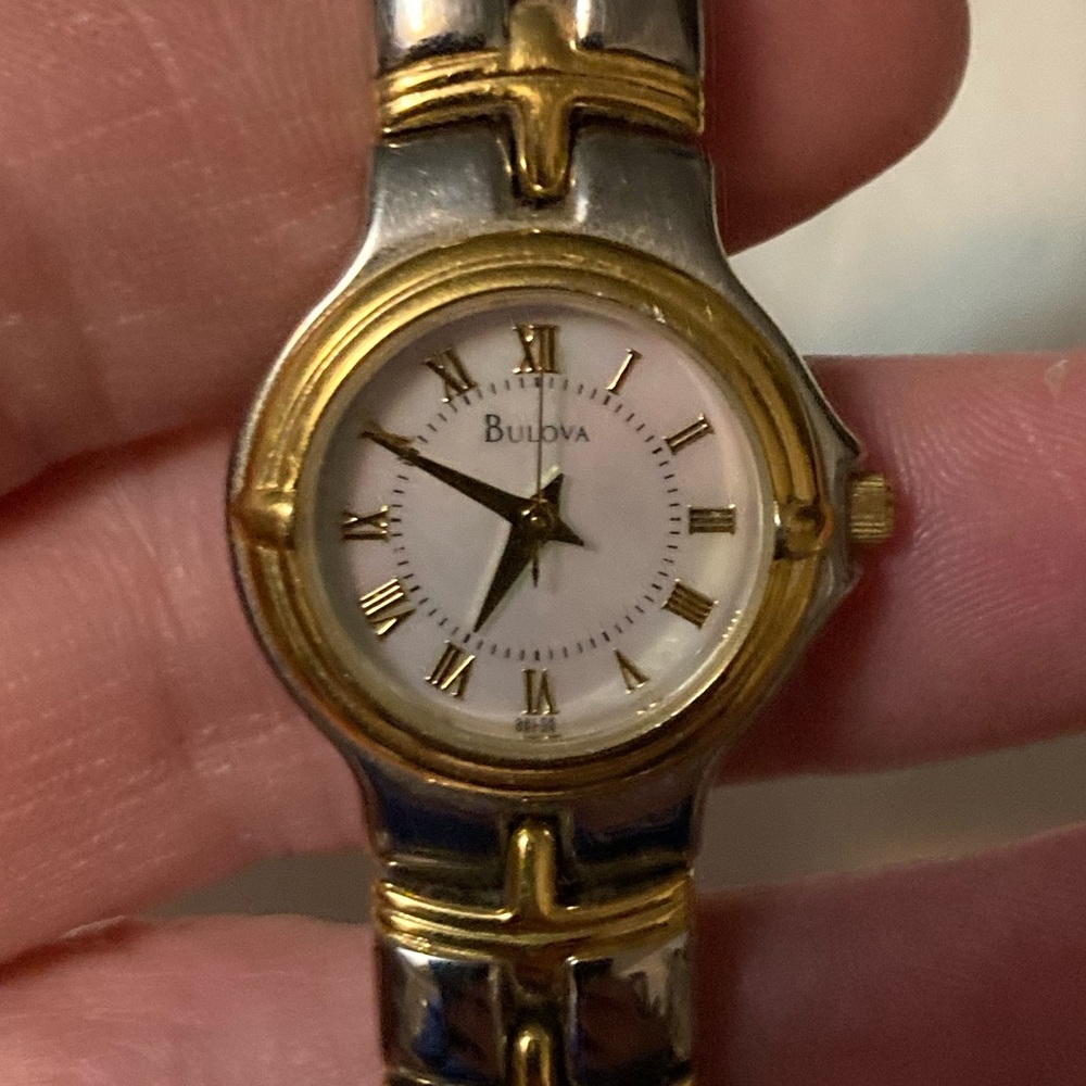 Bulova women’s watch silver and gold fits wrist size 6 1/4 inches or less.